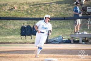 Creighton Bluejays Sydney Potter runs the bases after a home run during a college softball game against UCONN on March 28th, 2025 in Omaha, Nebraska. Photo by Brandon Tiedemann.