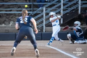 Creighton Bluejays Lily West hits during a college softball game against UCONN on March 28th, 2025 in Omaha, Nebraska. Photo by Brandon Tiedemann.