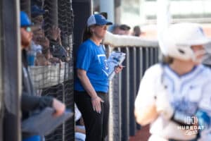 Creighton Bluejays head coach Krista Wood watches during a college softball game against UCONN on March 28th, 2025 in Omaha, Nebraska. Photo by Brandon Tiedemann.