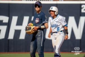 Creighton Bluejays Lily West cheers during a college softball game against UCONN on March 28th, 2025 in Omaha, Nebraska. Photo by Brandon Tiedemann.