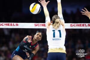 Omaha Supernovas Kelsie Payne (11) spikes the ball against Vegas Thrill Hannah Maddux (11) in the first set during a professional volleyball match Friday, March 28, 2025 in Omaha, Nebraska. Photo by John S. Peterson.