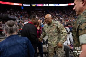 Johnny Rodgers shakes hands with General Cotton at a break in the action between the Supernovas and the Thrill during a professional volleyball match Friday, March 28, 2025 in Omaha, Nebraska. Photo by John S. Peterson.