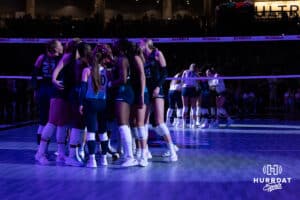 Omaha Supernovas and Vegas Thrill huddle up after introductions during a professional volleyball match Friday, March 28, 2025 in Omaha, Nebraska. Photo by John S. Peterson.