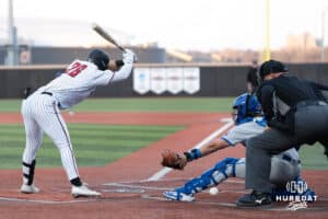 Omaha Mavericks Blake Stenger avoids the pitch during a college baseball game against Creighton on March 25th, 2025 in Omaha, Nebraska. Photo by Brandon Tiedemann.