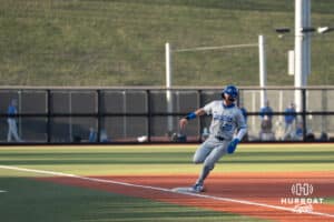 Creighton Bluejays Tate Gillen rounds third during a college baseball game against Omaha on March 25th, 2025 in Omaha, Nebraska. Photo by Brandon Tiedemann.