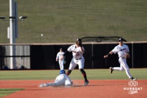 Creighton Bluejays Nolan Sailors steals second base during a college baseball game against Omaha on March 25th, 2025 in Omaha, Nebraska. Photo by Brandon Tiedemann.