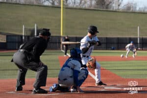 Omaha Mavericks Eli Hoerner watches a pitch during a college baseball game against Creighton on March 25th, 2025 in Omaha, Nebraska. Photo by Brandon Tiedemann.