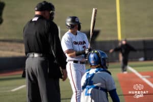 Omaha Mavericks Tyler Bishop waits for his at bat during a college baseball game against Creighton on March 25th, 2025 in Omaha, Nebraska. Photo by Brandon Tiedemann.