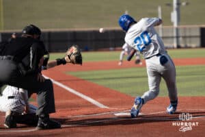 Creighton Bluejays Tate Gillen hits a ball foul during a college baseball game against Omaha on March 25th, 2025 in Omaha, Nebraska. Photo by Brandon Tiedemann.