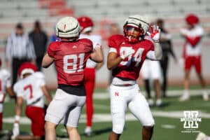 Wide receivers Haye Miller (81) and Isaish Mozee (84) celebrates a catch during Nebraska football practice Thursday, March 27, 2025 in Lincoln, Nebraska. Photo by John S. Peterson.