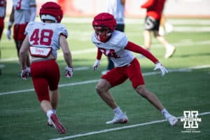 Preston Okafor (34) and Caden VerMaas (48) running tackling drills together during Nebraska football practice Thursday, March 27, 2025 in Lincoln, Nebraska. Photo by John S. Peterson.
