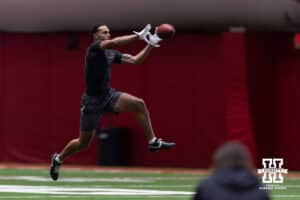 Noa Pola-Gates makes a catch during Nebraska Pro Day Tuesday, March 25, 2025 in Lincoln, Nebraska. Photo by John S. Peterson.