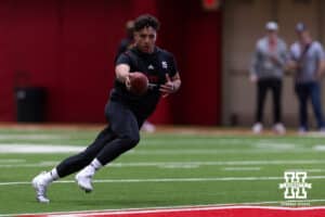 Dylan Raiola drops back to pass during Nebraska Pro Day Tuesday, March 25, 2025 in Lincoln, Nebraska. Photo by John S. Peterson.