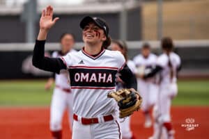 Omaha Maverick Maggie O'Brien high fives with teammate during a softball game at Connie Clausen Field on March 22nd, 2025 in Omaha Nebraska. Photo by Collin Stilen.