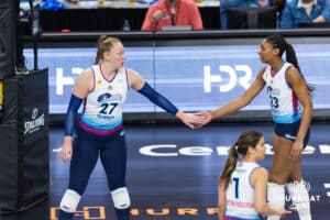 Omaha Supernovas Phoebe Awoleye (17) and Omaha Supernovas Kaitlyn Hord (23) give each other five against the Indy Ignite during a professional volleyball match Saturday, March 22, 2025 in Lincoln, Nebraska. Photo by John S. Peterson.
