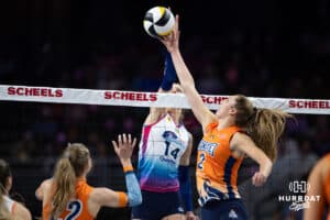 Omaha Supernovas Brooke Nuneviller (5) and Indy Ignite Sydney Hilley (2) battle at the net during a professional volleyball match Saturday, March 22, 2025 in Lincoln, Nebraska. Photo by John S. Peterson.
