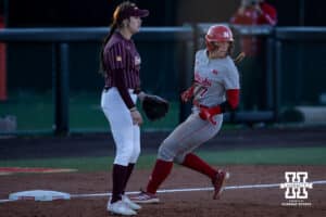 Nebraska Cornhusker Ava Kuszak (7) advances to third base in the in the sixth inning against the Minnesota Golden Gophers during a college softball game Friday, March 21, 2025 in Lincoln, Nebraska. Photo by John S. Peterson.