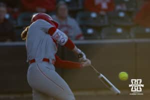 Nebraska Cornhusker Olivia DiNardo (1) singles in the sixth inning scoring Ava Kuszak to win the game against the Minnesota Golden Gophers during a college softball game Friday, March 21, 2025 in Lincoln, Nebraska. Photo by John S. Peterson.