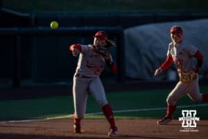 Nebraska Cornhusker Samantha Bland (29) throws to first for an out against the Minnesota Golden Gophers during a college softball game Friday, March 21, 2025 in Lincoln, Nebraska. Photo by John S. Peterson.