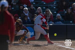 Nebraska Cornhusker Olivia DiNardo (1) singles in the third inning against the Minnesota Golden Gophers during a college softball game Friday, March 21, 2025 in Lincoln, Nebraska. Photo by John S. Peterson.