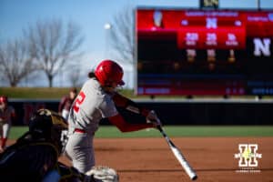 Nebraska Cornhusker Lauren Camenzind (2) singles in the first inning against Minnesota Golden Gophers during a college softball game Friday, March 21, 2025 in Lincoln, Nebraska. Photo by John S. Peterson.