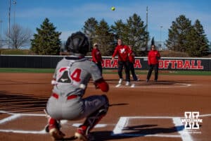 Opening pitch throw out to Nebraska Cornhusker Ava Bredwell (24) before taking on the Minnesota Golden Gophers during a college softball game Friday, March 21, 2025 in Lincoln, Nebraska. Photo by John S. Peterson.