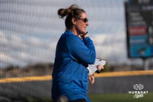 Creighton Bluejays head coach Krista Wood talks during a college softball game against Seattle on March 21st, 2025 in Council Bluffs, Iowa. Photo by Brandon Tiedemann.