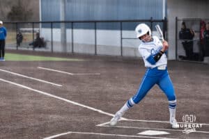 Creighton Bluejays Ella Dalton gets hit by a pitch during a college softball game against Seattle on March 21st, 2025 in Council Bluffs, Iowa. Photo by Brandon Tiedemann.