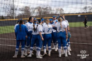 Creighton Bluejays huddle up during a college softball game against Seattle on March 21st, 2025 in Council Bluffs, Iowa. Photo by Brandon Tiedemann.