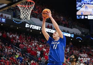 Creighton Bluejay center Ryan Kalkbrenner (11) makes a dunk against the Louisville Cardinals in the second half during the first round of the NCAA Men's Basketball Tournament Thursday, March 20, 2025, Lexington, Kentucky. Photo by Jeff Moreland.