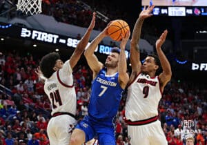Creighton Bluejay guard Fedor Zugic (7) goes for a lay up against Louisville Cardinal guard Chucky Hepburn (24) in the second half during the first round of the NCAA Men's Basketball Tournament Thursday, March 20, 2025, Lexington, Kentucky. Photo by Jeff Moreland.