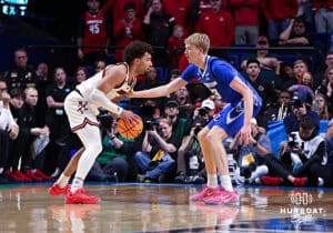 Creighton Bluejay forward Jackson McAndrew (23) guarding Louisville Cardinal guard J'Vonne Hadley (1) in the second half during the first round of the NCAA Men's Basketball Tournament Thursday, March 20, 2025, Lexington, Kentucky. Photo by Jeff Moreland.