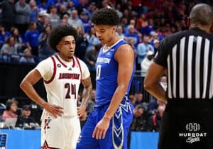 Creighton Bluejay forward Jasen Green (0) and Louisville Cardinal guard Chucky Hepburn (24) taking a breather at a break in the action in the first half during the first round of the NCAA Men's Basketball Tournament Thursday, March 20, 2025, Lexington, Kentucky. Photo by Jeff Moreland.