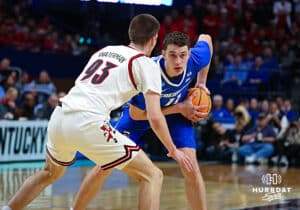 reighton Bluejay center Ryan Kalkbrenner (11) ready to make a move against Louisville Cardinal forward Noah Waterman (93) in the first half during the first round of the NCAA Men's Basketball Tournament Thursday, March 20, 2025, Lexington, Kentucky. Photo by Jeff Moreland.