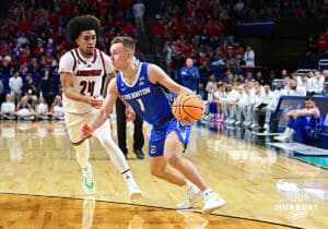 Creighton Bluejay guard Steven Ashworth (1) drive to the lane against Louisville Cardinal guard Chucky Hepburn (24) in the first half during the first round of the NCAA Men's Basketball Tournament Thursday, March 20, 2025, Lexington, Kentucky. Photo by Jeff Moreland.
