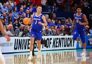 Creighton Bluejay guard Steven Ashworth (1) dribbles the ball down the court against the Louisville Cardinals during the first round of the NCAA Men's Basketball Tournament Thursday, March 20, 2025, Lexington, Kentucky. Photo by Jeff Moreland.