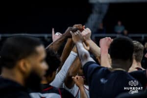 Omaha Mavericks huddle up during open practice before the first round of the NCAA Basketball Tournament on Wednesday, March 19, 2025 in Providence, Rhode Island. Photo by Cassie Baker.