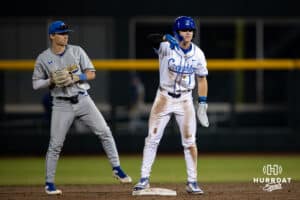 Creighton Bluejay outfielder Nolan Sailors (1) celebrates stealing second against South Dakota State Jackrabbits Nicholas Werk in the eighth inning during a college baseball game Tuesday, March 18, 2025 in Omaha, Nebraska. Photo by John S. Peterson.