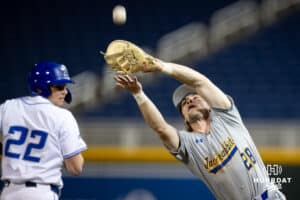 South Dakota State Jackrabbit first baseman Adam Benes (28) makes a catch for an out against Creighton Bluejay pinch hitter Dakota Duffalo (22) in the seventh during a college baseball game Tuesday, March 18, 2025 in Omaha, Nebraska. Photo by John S. Peterson.