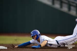 Creighton Bluejay outfielder Teddy Deters (4) slides to second base against the South Dakota State Jackrabbits during a college baseball game Tuesday, March 18, 2025 in Omaha, Nebraska. Photo by John S. Peterson.