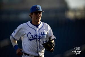 Creighton Bluejay infielder Kyle Hess (15) runs to the dugout after the top of the first against the South Dakota State Jackrabbits during a college baseball game Tuesday, March 18, 2025 in Omaha, Nebraska. Photo by John S. Peterson.