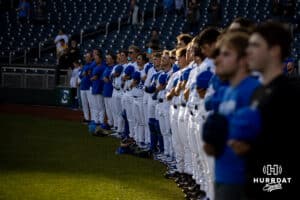 Creighton Bluejays standing in line for the National Anthem before taking on the South Dakota State Jackrabbits during a college baseball game Tuesday, March 18, 2025 in Omaha, Nebraska. Photo by John S. Peterson.