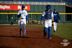Creighton Bluejay starting pitcher Ian Koosman (24) and catcher Nate McHugh walk to the dugout to start the game against the South Dakota State Jackrabbits during a college baseball game Tuesday, March 18, 2025 in Omaha, Nebraska. Photo by John S. Peterson.
