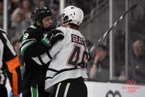 Omaha Mavericks Dylan Gratton fights back during a college hockey game against North Dakota on March 15th, 2025 in Omaha Nebraska. Photo by Brandon Tiedemann.