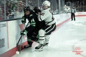 Omaha Mavericks Dylan Gratton goes after the puck during a college hockey game against North Dakota on March 15th, 2025 in Omaha Nebraska. Photo by Brandon Tiedemann.