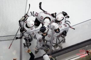 Omaha Mavericks celebrate a goal during a college hockey game against North Dakota on March 15th, 2025 in Omaha Nebraska. Photo by Brandon Tiedemann.