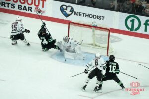 Omaha Mavericks Simon Latkoczy saves a goal during a college hockey game against North Dakota on March 15th, 2025 in Omaha Nebraska. Photo by Brandon Tiedemann.