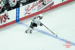 Omaha Mavericks Brock Bremer looks to pass during a college hockey game against North Dakota on March 15th, 2025 in Omaha Nebraska. Photo by Brandon Tiedemann.