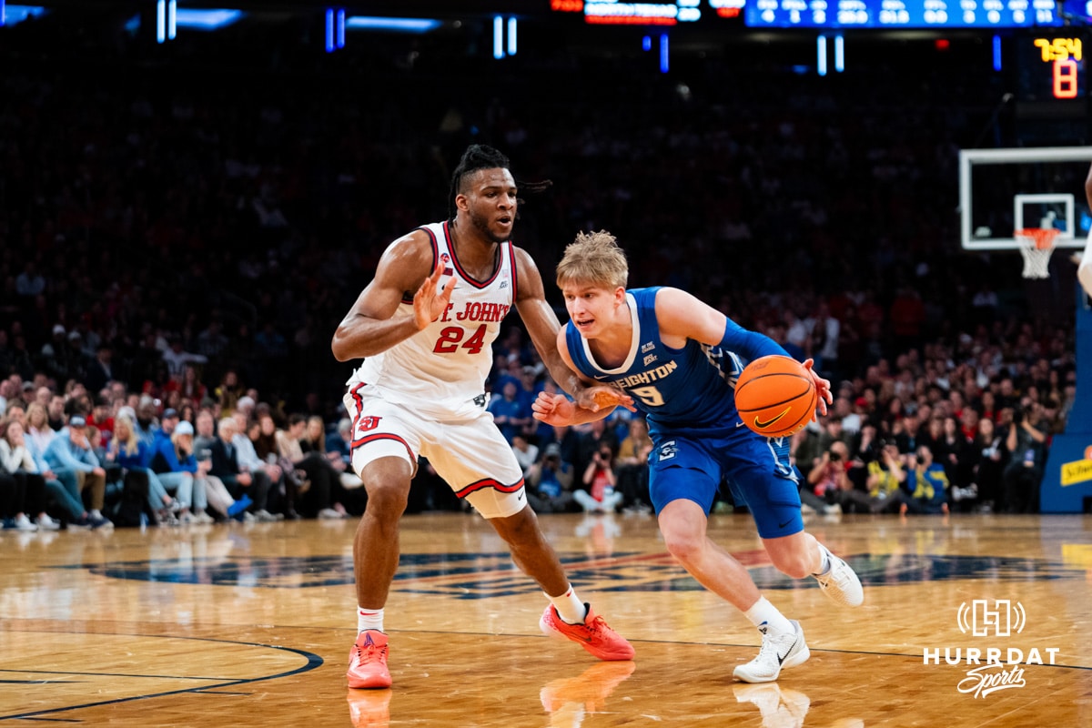 Creighton Bluejay guard Ty Davis (9) dribble sthe ball against St. John's Red Storm forward Zuby Ejiofor (24) during the Big East Tournament Finals on Saturday, March 15, 2025, in New York, New York. Photo by Jordan Arnold.