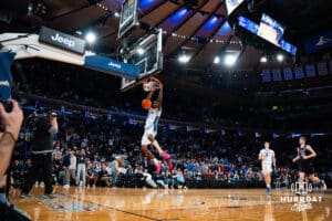Creighton Bluejay guard Jamiya Neal (5) dunks the ball in the last seconds of the game against the Connecticut Huskies during the semi-final round in the Big East Tournament Friday, March 14, 2025, New York, New York. Photo by Jordan Arnold.